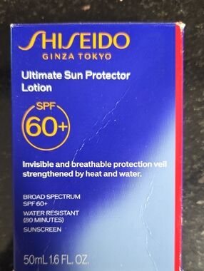 Shiseido Ultimate Sun Protector Lotion - Blue with Gold Accents